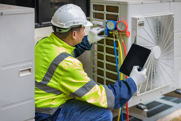 Professional Heat Pump Repair technician working in Sunset, UT